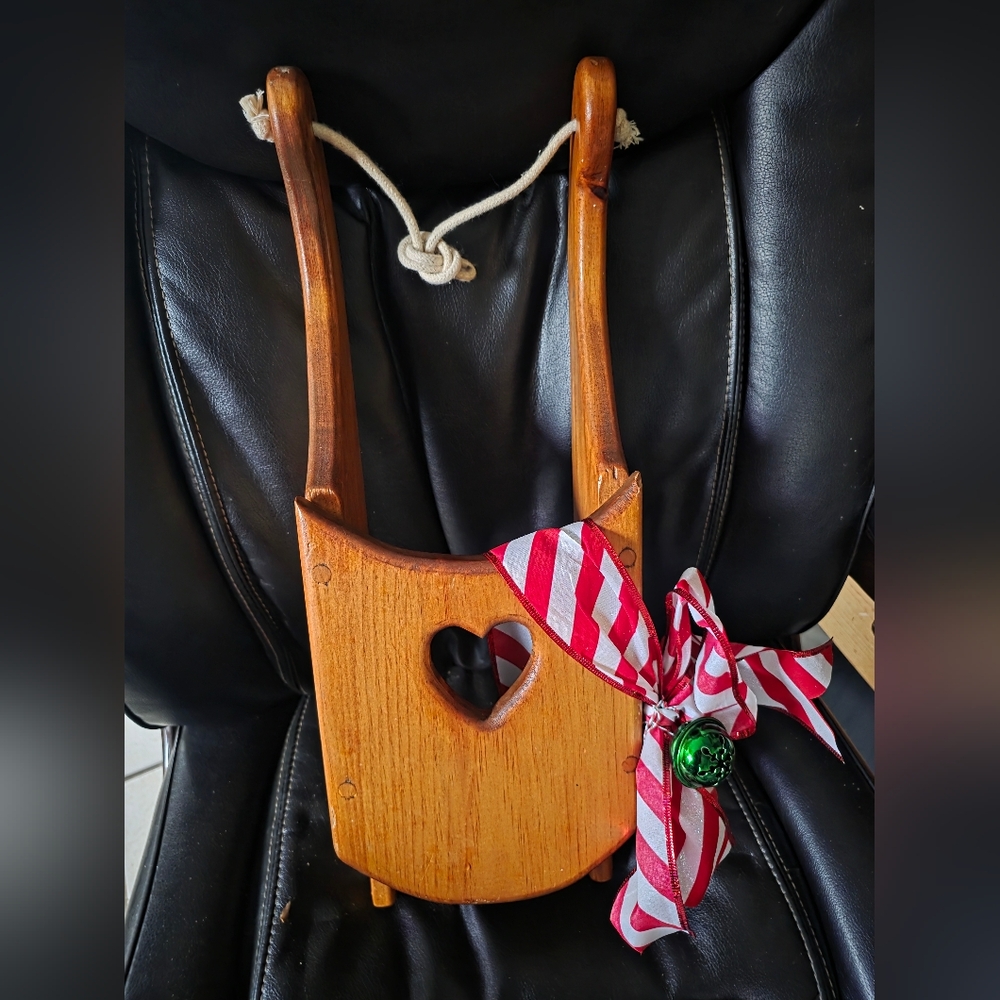 Wooden Sleigh With Cutout Heart, Bells & Bow For Christmas Door Decor